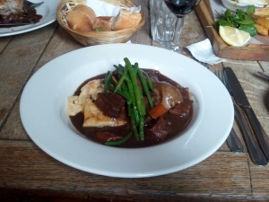 Generous beef bourguignon with very green green beans 